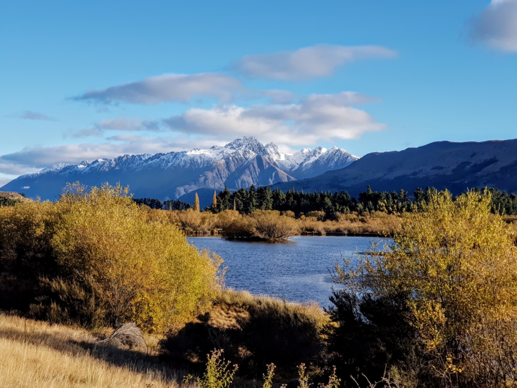 Snow topped mountains and Glenorchy lagoon in autumn