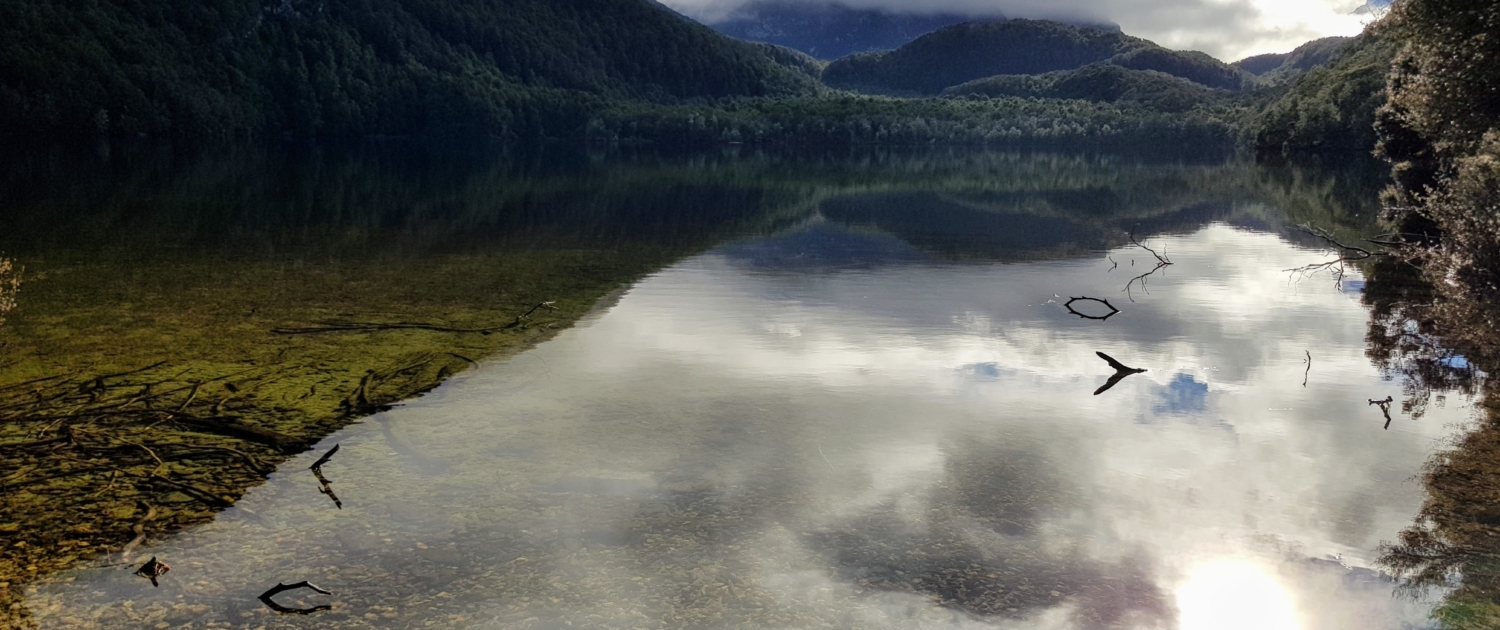 Lake Sylvan with reflections of clouds and mountains