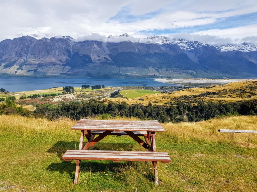 Picnic bench with view of Glenorchy, lake and mountains