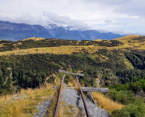 Old mining track ends in air above valley