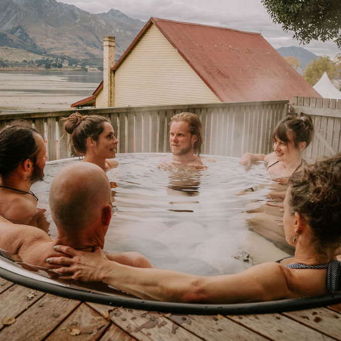 Group of people sat in hot tub